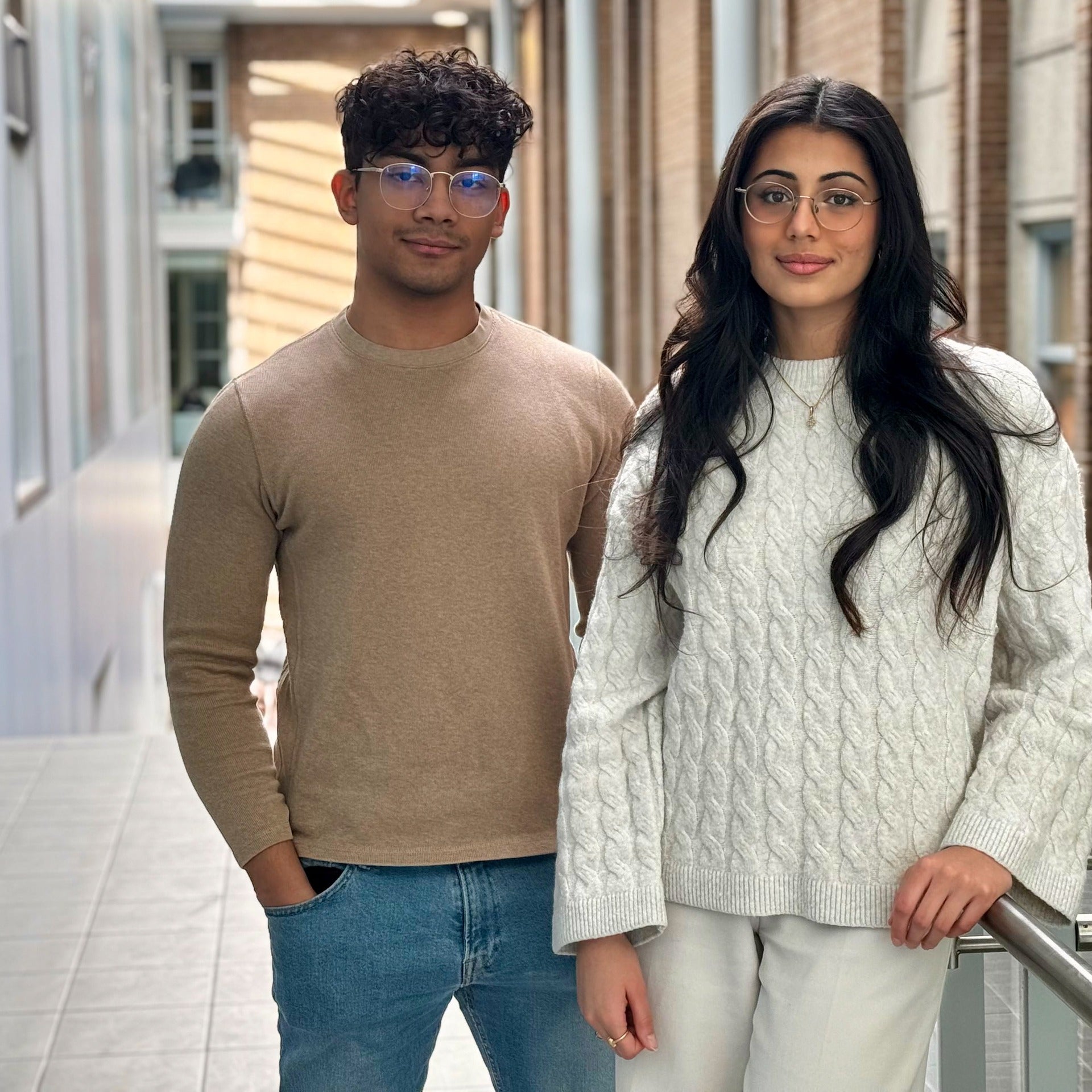 Kritika Grover and Murto Hilali standing together on the second floor of the Science Teaching Complex building